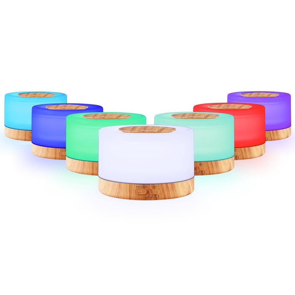 Essential oil diffuser. Wood grain base, light up top in 7 different colours